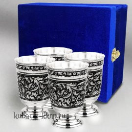 Набор из четырех серебряных стаканов 