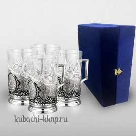 Набор из четырех серебряных подстаканников 