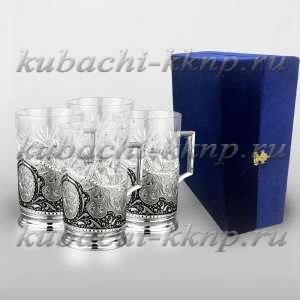 Набор из четырех серебряных подстаканников 